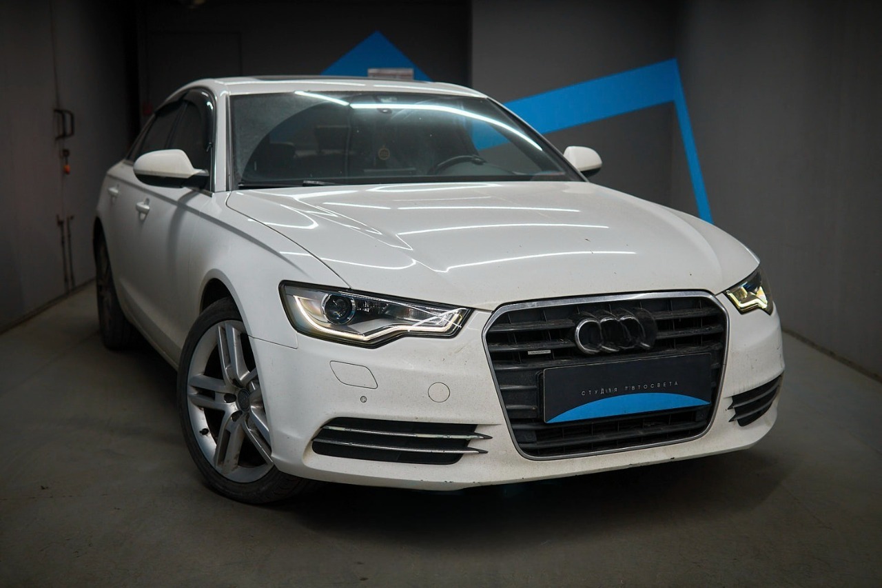Audi A6 в студии автосвета «Авто-108» после установки Bi-LED линз и замены стёкол фар