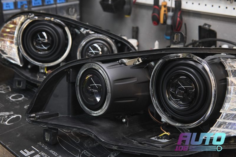 Фары BMW X5 E70 с масками в чёрном мате (антихром) и новыми Bi-LED линзами