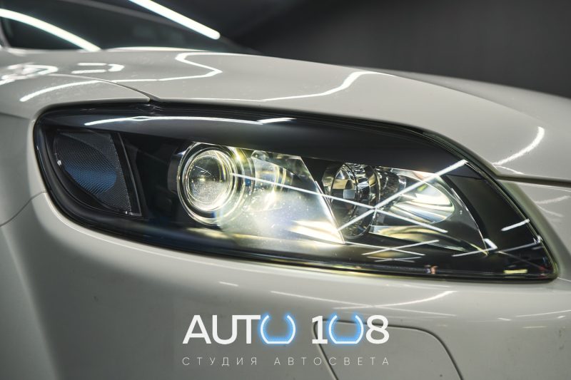 Audi Q7 4L с фарами в чёрном мате и Bi-LED линзами после работ