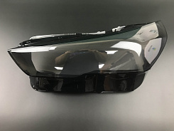 Стекло фары BMW 5 G60 (2023-н.в.) (левое)