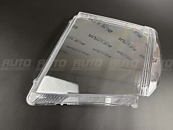 Стекло фары NISSAN PATHFINDER R51 / NAVARA (2004-2010) дорестайлинг (левое)