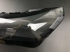Стекло фары BMW 5 G60 (2023-н.в.) (левое)