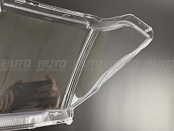 Стекло фары NISSAN PATHFINDER R51 / NAVARA (2004-2010) дорестайлинг (правое)